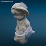 statua in terracotta da giardino raffigurante un tenero bimbo inginocchiato con secchiello