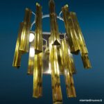 40144_1 Applique in vetro di Murano con 10 triedri ambra e base cromata