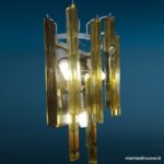40144_2 Applique in vetro di Murano con 10 triedri ambra e base cromata