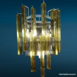 40144_3 Applique in vetro di Murano con 10 triedri ambra e base cromata