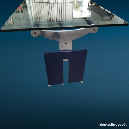 Tavolo design in cristallo con struttura in acciaio e alluminio