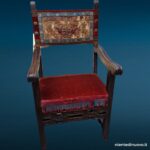 04571 Poltroncina rustica a cartella in noce (databile XVII secolo)