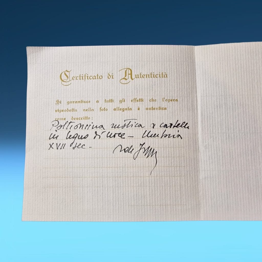 Scopri l'eleganza senza tempo della poltroncina rustica a cartella in noce del XVII secolo, completa di certificato di autenticità.