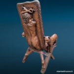40887_3 Poltrona in resina con braccioli a forma di gatti e figura femminile