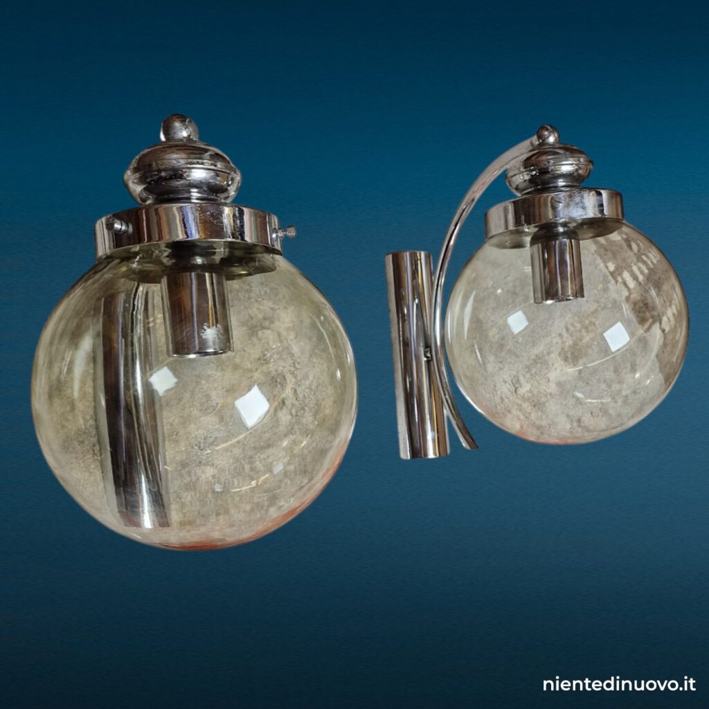 Coppia di appliques anni 70 in acciaio e vetro