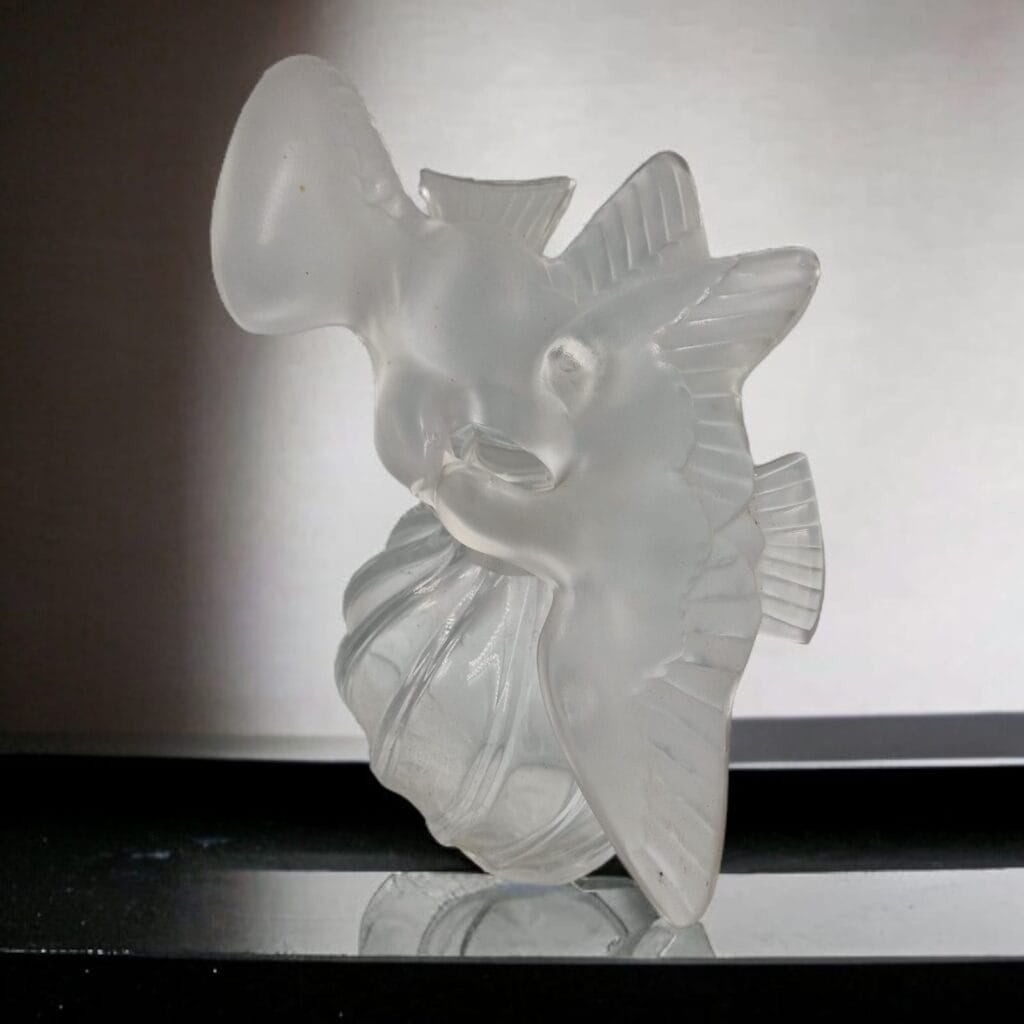 Flacone Lalique "Air de Temps" di Nina Ricci anni '60 con design in vetro soffiato