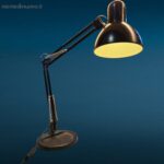 lampada a molle snodata con base in ghisa colore nero, stile vintage industriale