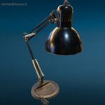 lampada a molle snodata con base in ghisa colore nero, stile vintage industriale