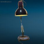 lampada a molle snodata con base in ghisa colore nero, stile vintage industriale