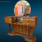 Pettineuse vintage anni ’60 con specchio tondo centrale in condizioni discrete