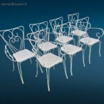 Sedia vintage in ferro da esterno con struttura decorativa