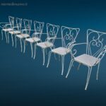 Sedia vintage in ferro da esterno con struttura decorativa