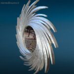 Specchio in legno a spirale con cornice argentata decorativa