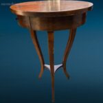 Tavolino tondo in legno con gambe mosse e cassetto centrale