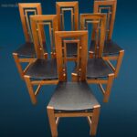 Set da 6 sedie di design anni 80 in legno con seduta in similpelle nera