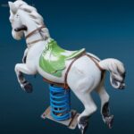 vecchio cavallino da giostra con base in metallo e mollone oscillante
