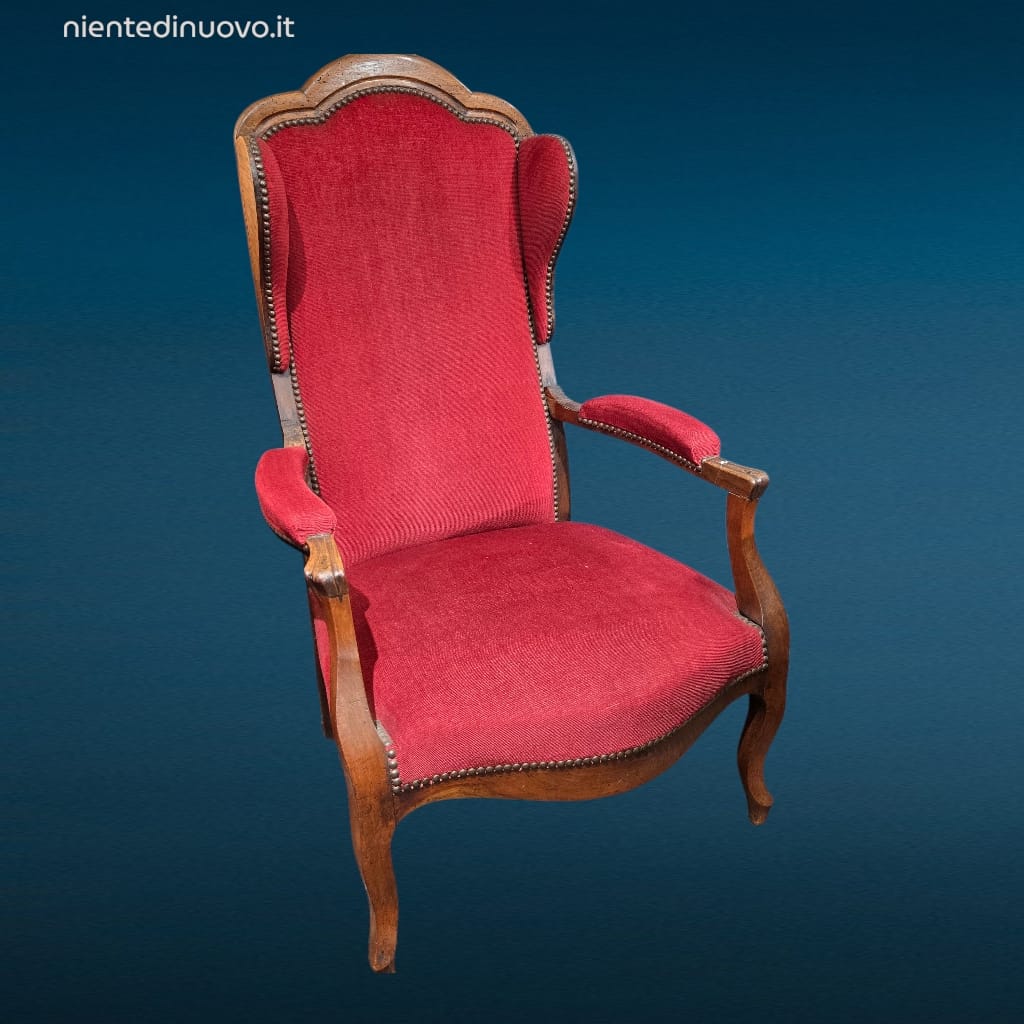 poltrona in noce d’epoca Ottocentesca con tessuto rosso restaurata