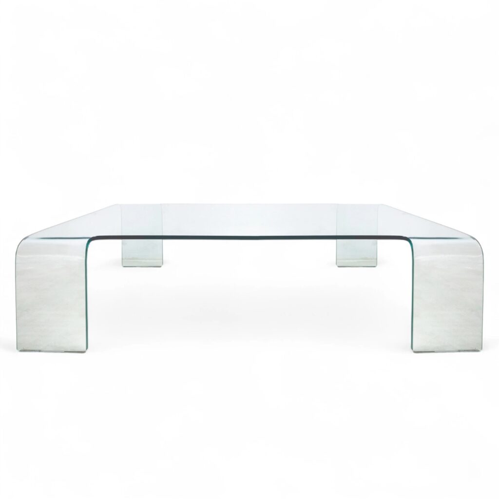 Tavolino design in vetro curvato trasparente anni '90 in ottime condizioni