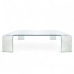 Tavolino design in vetro curvato trasparente anni '90 in ottime condizioni