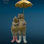 Coppia di rane in resina colorata con ombrello in ferro decorativo