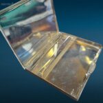 Portasigarette vintage in argento 925 con superficie lavorata e interno a specchio