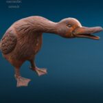 Papera da esterno in ghisa in posizione d’attacco per giardino