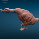 Papera da esterno in ghisa in posizione d’attacco per giardino