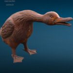 Papera da esterno in ghisa in posizione d’attacco per giardino