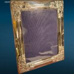 Cornice portaritratto 29x34 in argento 925 con angoli lavorati e retro in legno