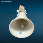 Porcellana LLADRÓ It’s a Girl con bambina seduta su fiore e campanellino