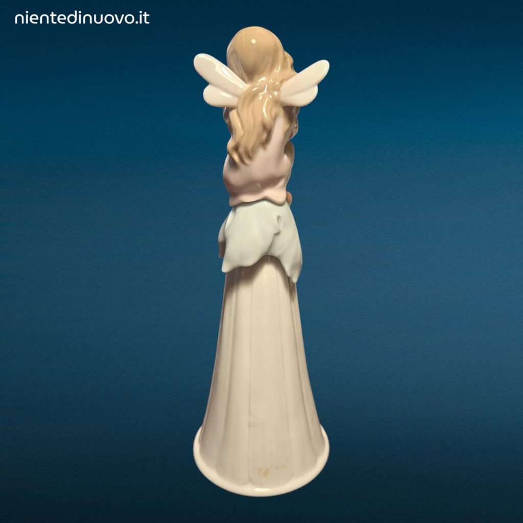 Porcellana LLADRÓ It’s a Girl con bambina seduta su fiore e campanellino