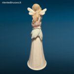 Porcellana LLADRÓ It’s a Girl con bambina seduta su fiore e campanellino