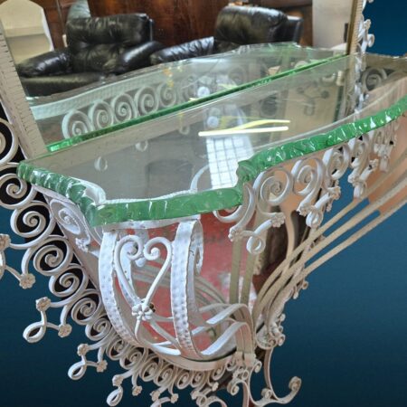 Specchiera ovale anni 50 Pierluigi Colli in ferro martellinato con mensola