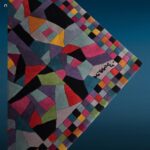 Tappeto Missoni Festival multicolore 170x240 in lana con lavorazione scolpita a formelle