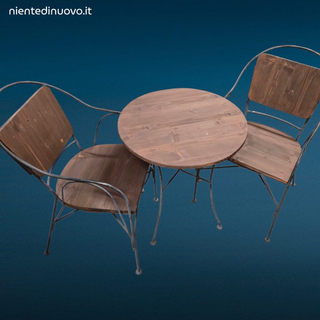 Set tavolino tondo con due poltroncine in ferro battuto e schienali in legno