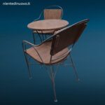 Set tavolino tondo con due poltroncine in ferro battuto e schienali in legno