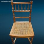 Sedia in noce stile Luigi XVI con seduta in paglia di Vienna