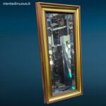 Specchio da parete incorniciato con lavorazione a bisello formato 27x56