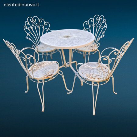 Salottino completo da esterno vintage in ferro battuto con quattro sedie e tavolino rotondo