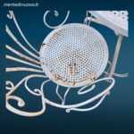 Salottino completo da esterno vintage in ferro battuto con quattro sedie e tavolino rotondo