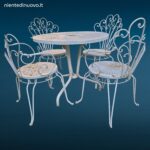 Salottino completo da esterno vintage in ferro battuto con quattro sedie e tavolino rotondo