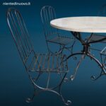 Set da giardino in ferro battuto pieno con tavolo rotondo piano in marmo diametro 110 cm e quattro sedie abbinate