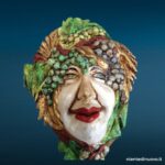 Maschera veneziana artigianale in cartapesta decorata